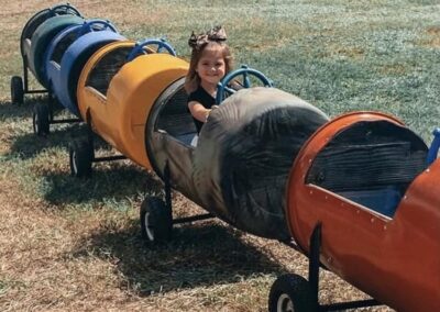 Kid enjoying the Barrel Train