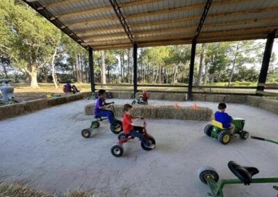 Kids racing through the Sunflower Barn